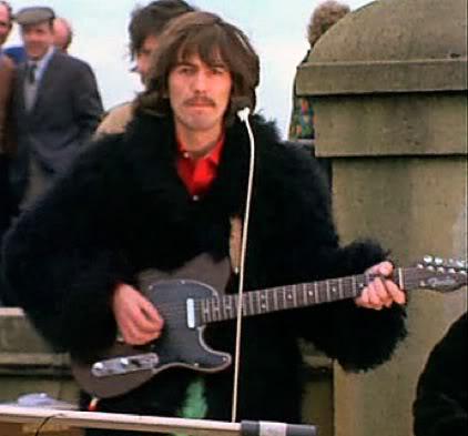 George Harrison with his Rosewood Telecaster at the Beatles' Final Concert